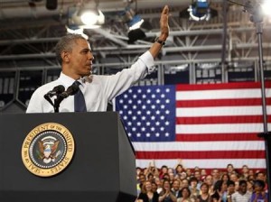 U.S. President Obama waves to students at Washington-Lee High School in Virginia