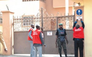 Officials of the anti-graft agency sealing one of the buildings in Abuja.