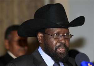 South Sudanese President Kiir speaks during a news conference with his Sudanese counterpart al-Bashir at Khartoum Airport