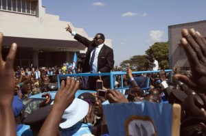 Malawi's President Mutharika of the Democratic Progressive Party waves to supporters after he was sworn in in Blantyre