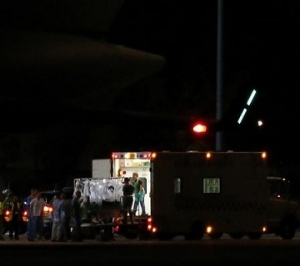 British man infected with Ebola virus is loaded into RAF ambulance after being flown home on a C17 plane from Sierra Leone, at Northolt air base outside London