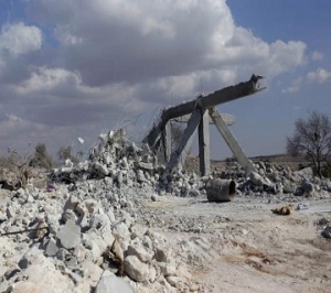 A damaged site is seen in what activists say was a U.S. strike, in Kfredrian