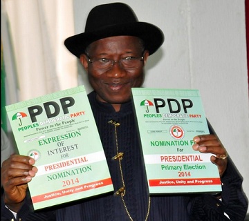 Goodluck Jonathan with party nomination form.