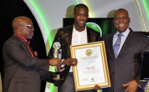 Delta-State-Governor-Emmanuel-Uduaghan-African-Footballer-of-the-year-Yaya-Toure-and-Issa-Hayatou-during-the-2014-GLO-CAF-Award-in-Lagos-360x225