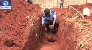 Police-taking-out-bullets-from-the-foundation