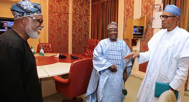 President Buhari having a chat with Governor Lalong and Mr Akeredolu