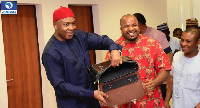 bukola-saraki-displays-made-in-nigeria-bag