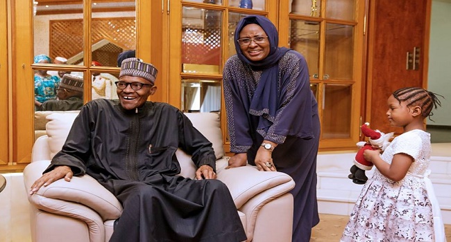 Buhari with his wife and grand-daughter 