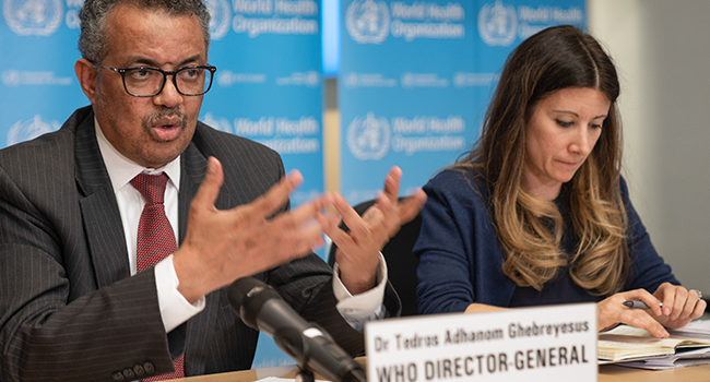 This handout picture made available by World Health Organization (WHO) shows WHO Director-General Tedros Adhanom Ghebreyesus (L) speaking next to WHO Technical Lead Maria Van Kerkhove during a virtual press briefing on the novel coronavirus (COVID-19) virus at the WHO headquaters in Geneva on March 16, 2020. Christopher Black / World Health Organization / AFP