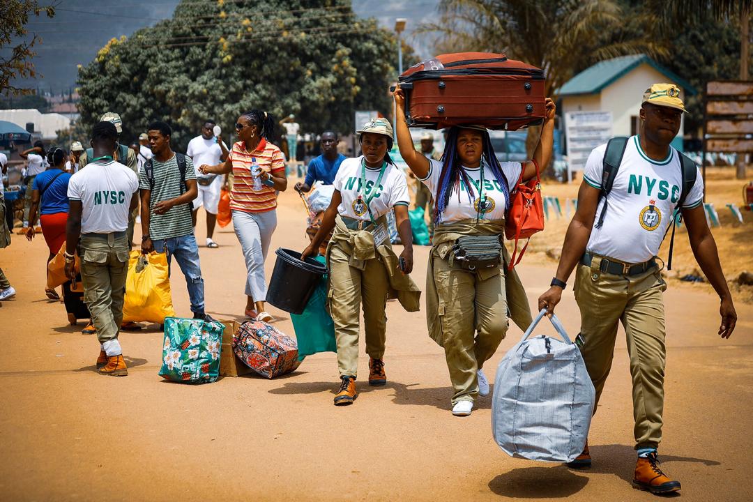 Members of the National Youth Service Corps departs the FCT orientation camp in Kubwa, Abuja on Wednesday, March 18th, 2020. Photo: Sodiq Adelakun / Channels TV