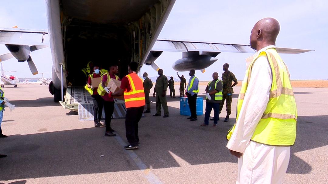 Workers unload a consignment of medical supplies donated by Chinese billionaire, Jack Ma, to help deal with the coronavirus pandemic, after arriving at the Nnamdi Azikwe International Airport in Abuja, Nigeria on Wednesday, March 25, 2020. Channels Television / Sodiq Adelakun.