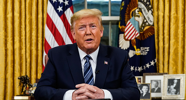 US President Donald Trump addresses the Nation from the Oval Office about the widening novel coronavirus (Covid-19) crisis in Washington, DC on March 11, 2020. Doug Mills / POOL / AFP