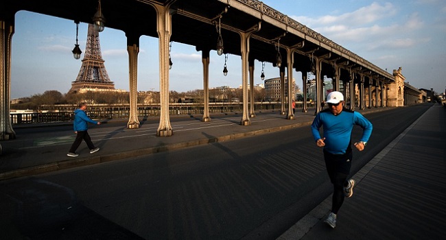 Paris bans daytime jogging as coronavirus deaths in France top 10,000