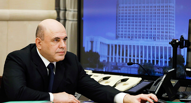 Russian Prime minister Mikhail Mishustin chairs a meeting with members of the government via teleconference call in Moscow on April 30, 2020. Dmitry Astakhov / SPUTNIK / AFP