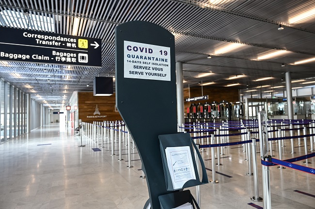 A photograph taken on June 22, 2020, shows an information board for travelers in the arrival area of the Terminal 3 at the Orly airport, in Orly on the outskirts of Paris, a few days before its reopening as France eases lockdown measures taken to curb the spread of the COVID-19 (the novel coronavirus). - The airport should reopen on June 26, 2020 after being closed as part of the measures adopted by French government to fight against the COVID-19 pandemic. (Photo by BERTRAND GUAY / AFP)