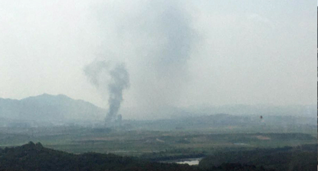Smoke rise from North Korea's Kaesong Industrial Complex where an inter-korean liaison office was set up in 2018, as seen from South Korea's border city of Paju on June 16, 2020. STR / YONHAP / AFP