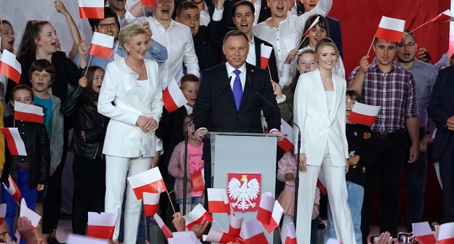 Polish President Andrzej Duda addresses supporters as exit poll results were announced during the presidential election in Pultusk, Poland, on July 12, 2020. - Poland's right-wing head of state Andrzej Duda was ahead by a tiny margin in the presidential run-off against Warsaw's liberal mayor, an exit poll on on July 12, 2020 showed, starting a tense wait for the official results (Photo by JANEK SKARZYNSKI / AFP)
