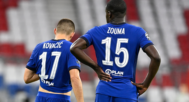 Chelsea's Croatian midfielder Mateo Kovacic (L) and Chelsea's French defender Kurt Zouma reacts at the end of the UEFA Champions League, second-leg round of 16, football match FC Bayern Munich v FC Chelsea in Munich, southern Germany on August 8, 2020. Tobias SCHWARZ / AFP