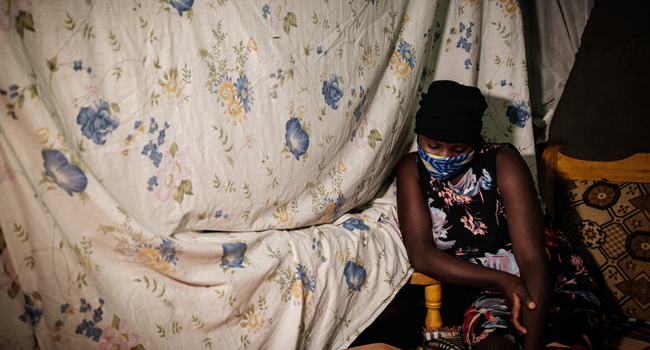 Linet, 16, who is in about 3 months pregnant talks about her unexpected pregnancy as schools are closed due to the COVID-19 outbreak, during an AFP interview at her sister's home in Raila slum, next to Kibera slum, in Nairobi, on July 15, 2020.  Yasuyoshi CHIBA / AFP