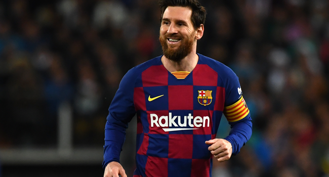 In this file photo taken on March 01, 2020, Barcelona's Argentine forward Lionel Messi smiles during the Spanish League football match between Real Madrid and Barcelona at the Santiago Bernabeu stadium in Madrid. GABRIEL BOUYS / AFP