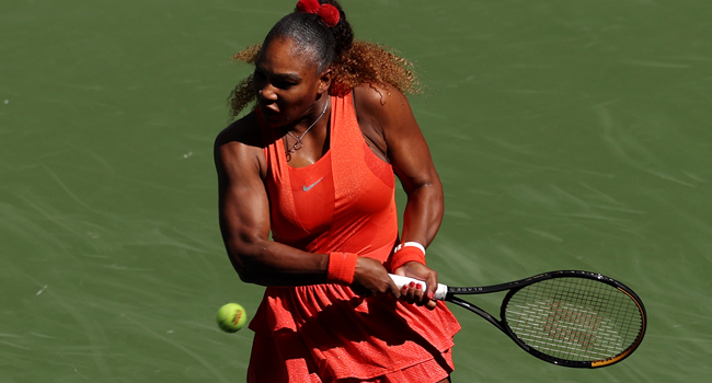 Serena Williams of the United States returns a shot during her Women’s Singles third round match against Sloane Stephens of the United States on Day Six of the 2020 US Open at USTA Billie Jean King National Tennis Center on September 05, 2020 in the Queens borough of New York City. Al Bello/Getty Images/AFP