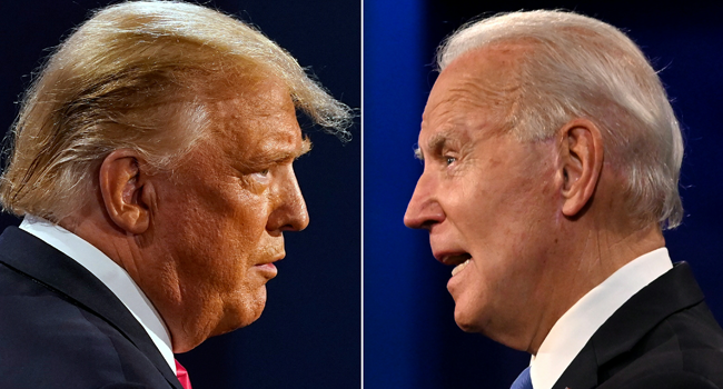 This combination of file pictures created on October 22, 2020 shows US President Donald Trump (L) and former Democratic Presidential candidate and former US Vice President Joe Biden during the final presidential debate at Belmont University in Nashville, Tennessee, on October 22, 2020. JIM WATSON, Morry GASH / AFP