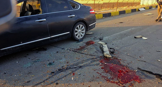 A handout photo made available by Iran state TV (IRIB) on November 27, 2020, shows the damaged car of Iranian nuclear scientist Mohsen Fakhrizadeh after it was attacked near the capital Tehran. IRIB NEWS AGENCY / AFP