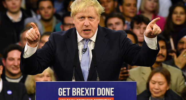 In this file photo taken on December 11, 2019 Britain's Prime Minister and Conservative party leader Boris Johnson speaks during a general election campaign rally in East London on December 11, 2019, the final day of campaigning for the general election. Ben STANSALL / AFP