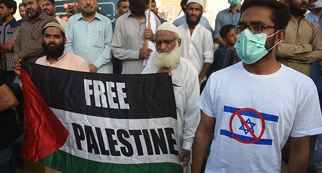 Supporters of Islamic political party Jamaat-e-Islami (JI) gather during a demonstration in Karachi on May 11, 2021, to protest against Israel's deadly air strikes launched on Gaza killing at least 28 people. Rizwan TABASSUM / AFP