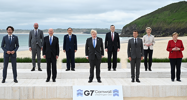 anada's Prime Minister Justin Trudeau, President of the European Council Charles Michel, US President Joe Biden, Japan's Prime Minister Yoshihide Suga, Britain's Prime Minister Boris Johnson, Italy's Prime minister Mario Draghi, France's President Emmanuel Macron, President of the European Commission Ursula von der Leyen and Germany's Chancellor Angela Merkel pose for the family photo at the start of the G7 summit in Carbis Bay, Cornwall on June 11, 2021. Leon Neal / POOL / AFP