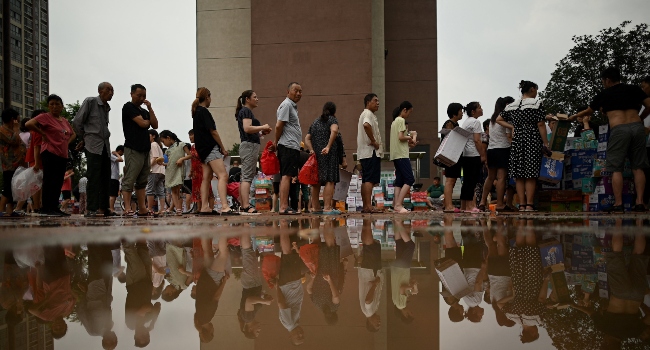 Chinese City Zhengzhou Picks Through Debris After Record Rains Kill 33 China Floods 1