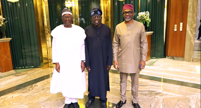 Ibrahim Gambari, President Bola Tinubu and Femi Gbajabiamila pose for pictures during the handover session at the villa in Abuja on 5th June 2023