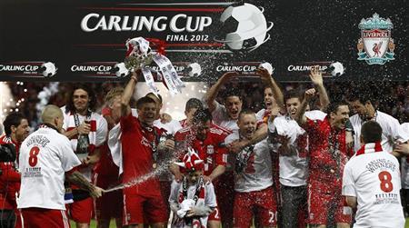 Liverpool survive Cardiff scare to win Carling Cup