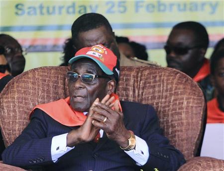 Zimbabwe’s Mugabe “well, on holiday”: officials