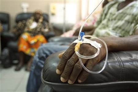 Cancer patients sit in a chemotherapy ward while receiving treatment at the Korle Bu Teaching Hospital in Accra, April 24, 2012. Most of Africa's around 2,000 languages have no word for cancer. The common perception in both developing and developed countries is that it's a disease of the wealthy world, where high-fat, processed-food diets, alcohol, smoking and sedentary lifestyles fuel tumour growth. Yet there are an estimated one million new cancer cases sub-Saharan Africa will see this year - a number predicted to double to 2 million a year in the next decade. Picture taken April 24, 2012. Photo: REUTERS