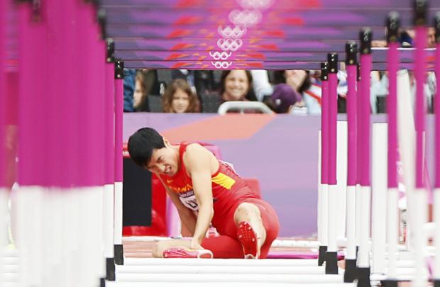 China’s Liu limps out of Games, Bolt is back