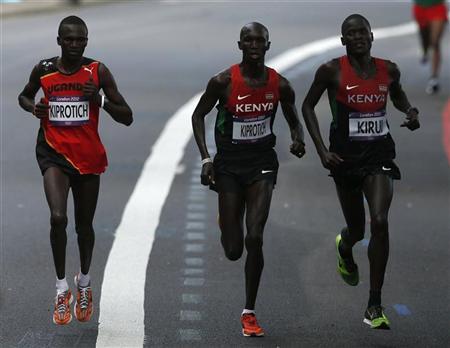 Ugandan takes marathon, US win most golds