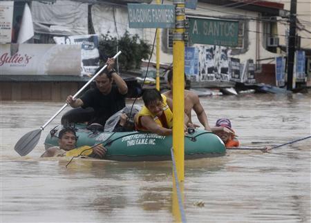 Monsoon rains swamp Philippine capital, markets shut