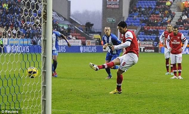 Arsenal goes third with win at Wigan