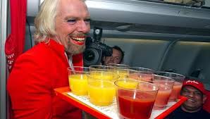 Richard Branson Turns Female Flight Attendant After Losing Bet