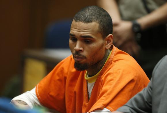 Chris Brown’s Bodyguard Claims To Punch Victim In The Face