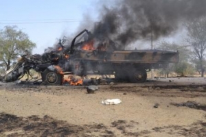 A terrorists vehicle set ablaze by troops