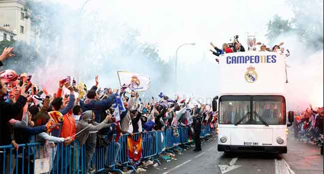Real Madrid players celebrating a goal in the Champions League