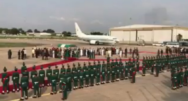 [PHOTOS] Buhari’s Arrival: Police Mount Presidential Guard Of Honour