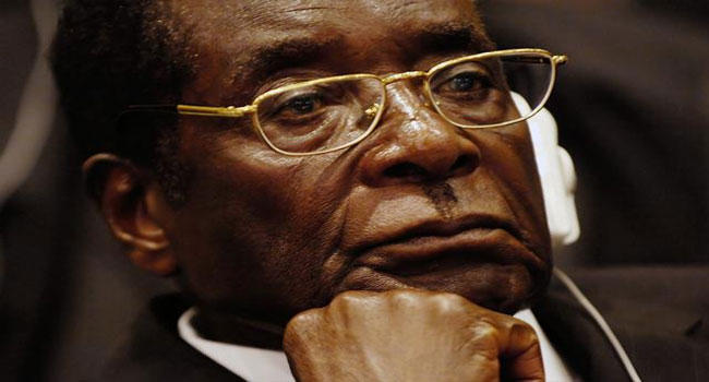 Mugabe’s Ex-VP Flees Zimbabwe Anti-Corruption Probe