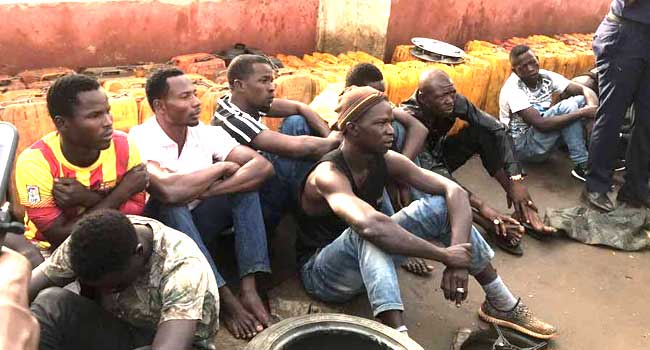 PHOTOS: NNPC Boss, Security Operatives Storm Black Marketers’ Depot