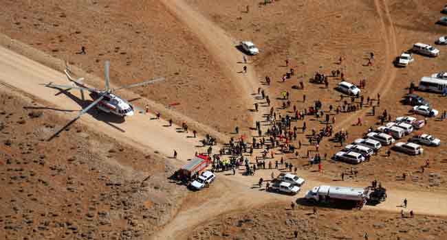 Iran Teams Carry Plane Crash Dead Down From Mountain