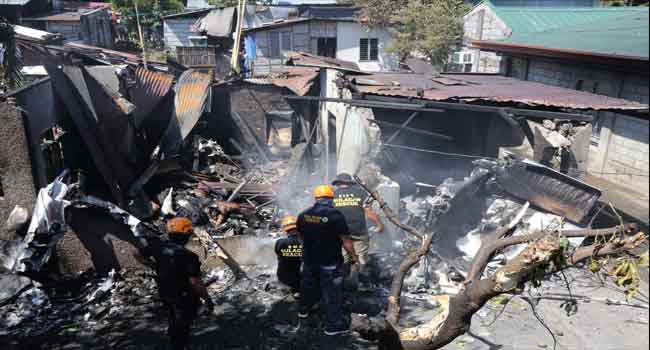 10 Dead As Philippine Plane Crashes Into House
