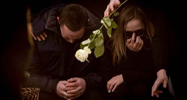Slain Slovak Journalist Buried As Police Free Suspects
