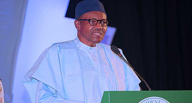 Buhari addresses on podium Buhari Promises Secure, More Prosperous Nigeria • Channels Television
